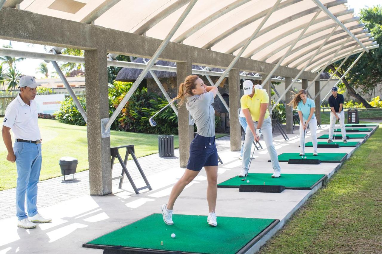 Constance Prince Maurice Poste de Flacq Exteriör bild Golfers practicing at a driving range